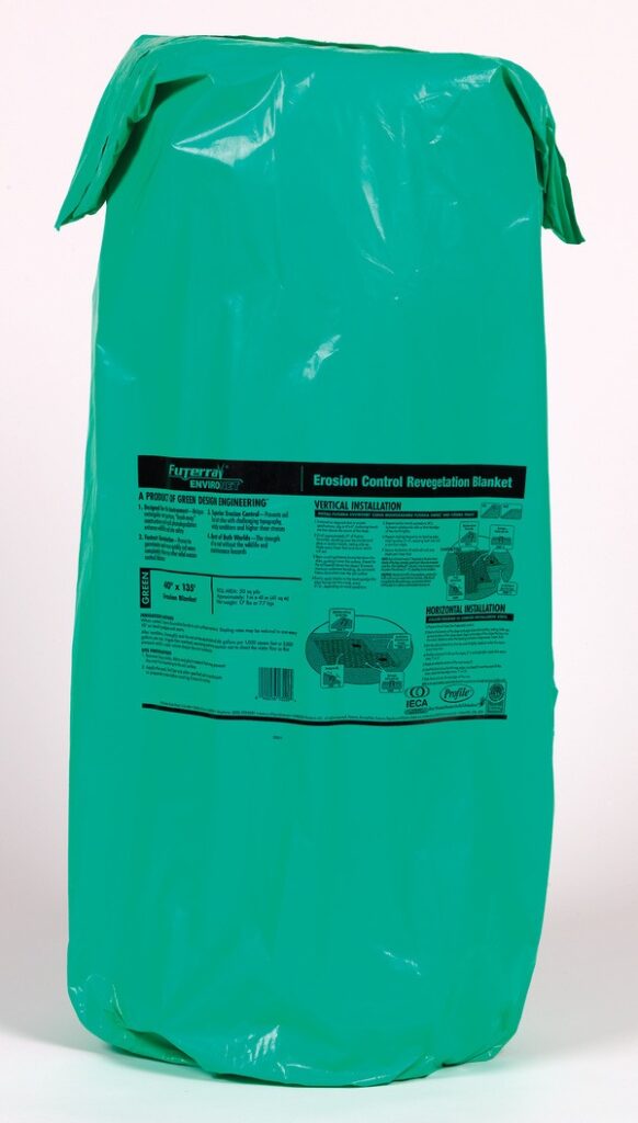 A large, green, packaged erosion control revegetation blanket, branded "Futerra EnviroNet," stands upright with detailed installation instructions visible on the front.